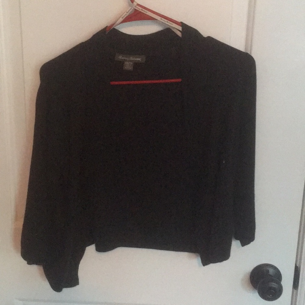 Cropped black cardigan.